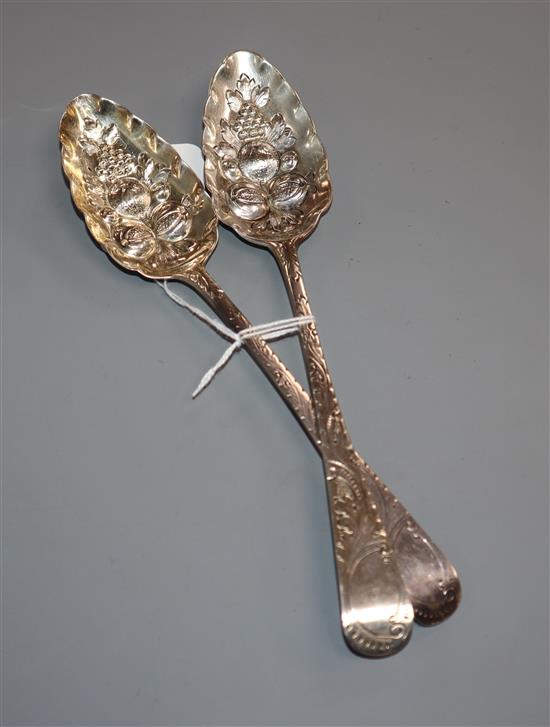 A pair of George III silver later embossed Old English pattern berry spoons, Godbehere & Wigan, London, 1796.